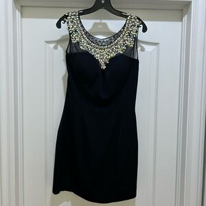 Hannah S size 12 black dress with mesh and rhinestones